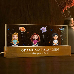 Personalized mom garden LED night light featuring kids in a garden setting with floral designs