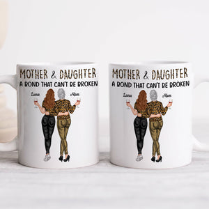 Personalized mother daughter mug featuring two women with text A Bond That Can't Be Broken