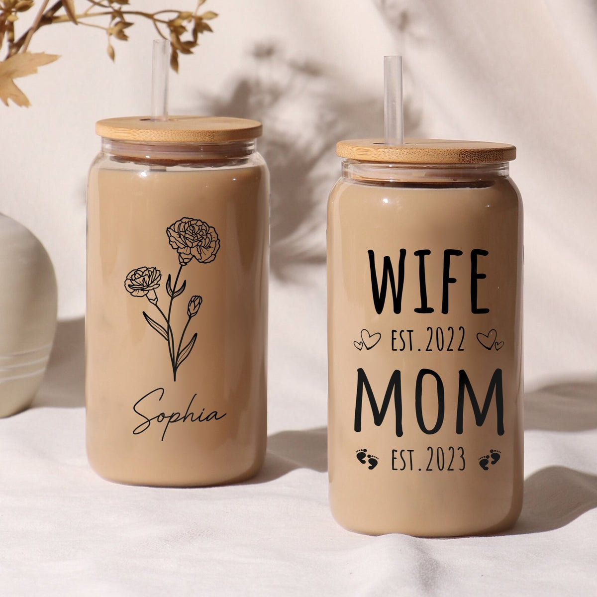 Personalized Mother's Day glass can with floral design and custom names for a thoughtful gift