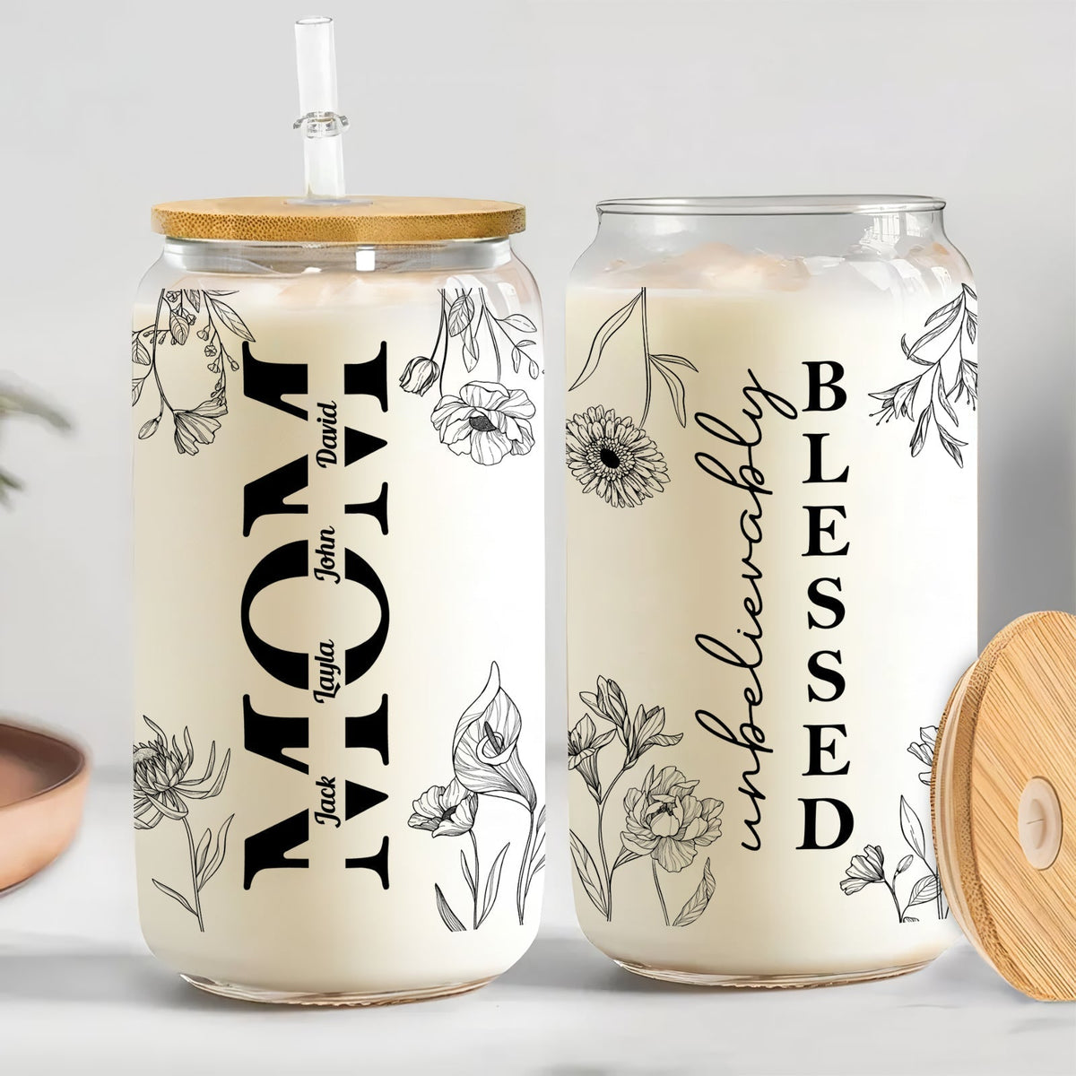 Personalized Mother's Day glass can with floral design and custom names for a heartfelt gift