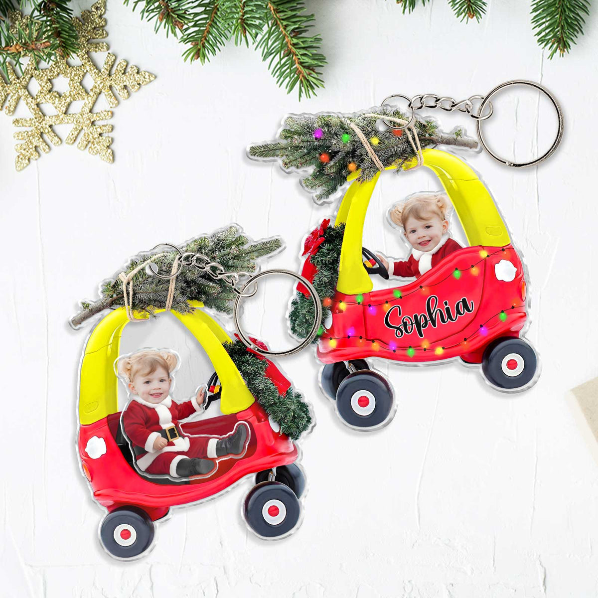 Personalized new parent gift idea featuring a custom photo keychain of a child in a toy car with a Christmas tree