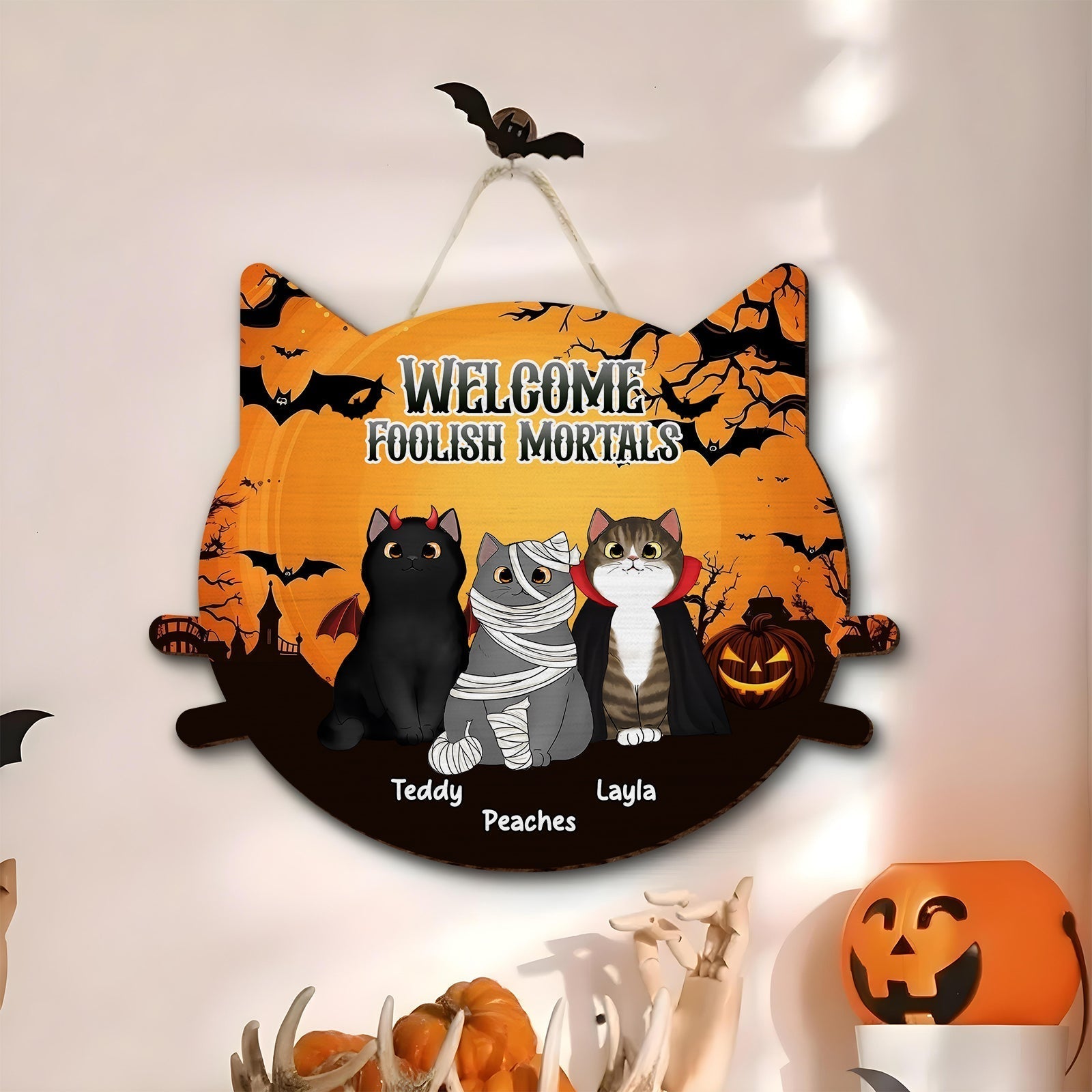 Personalized pet door sign featuring Halloween theme with three cats and spooky decorations