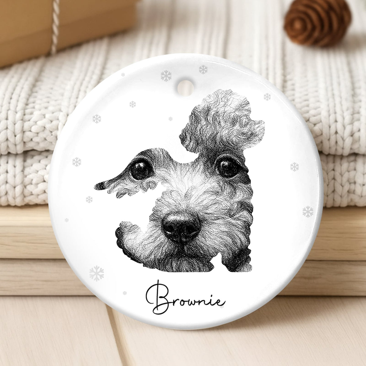 Personalized pet loss ornament featuring a custom pet portrait with the name Brownie