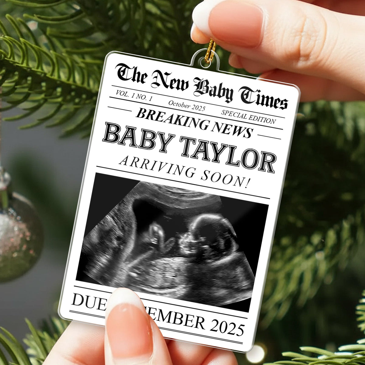 Personalized pregnancy announcement ornament with a newspaper design and due date details