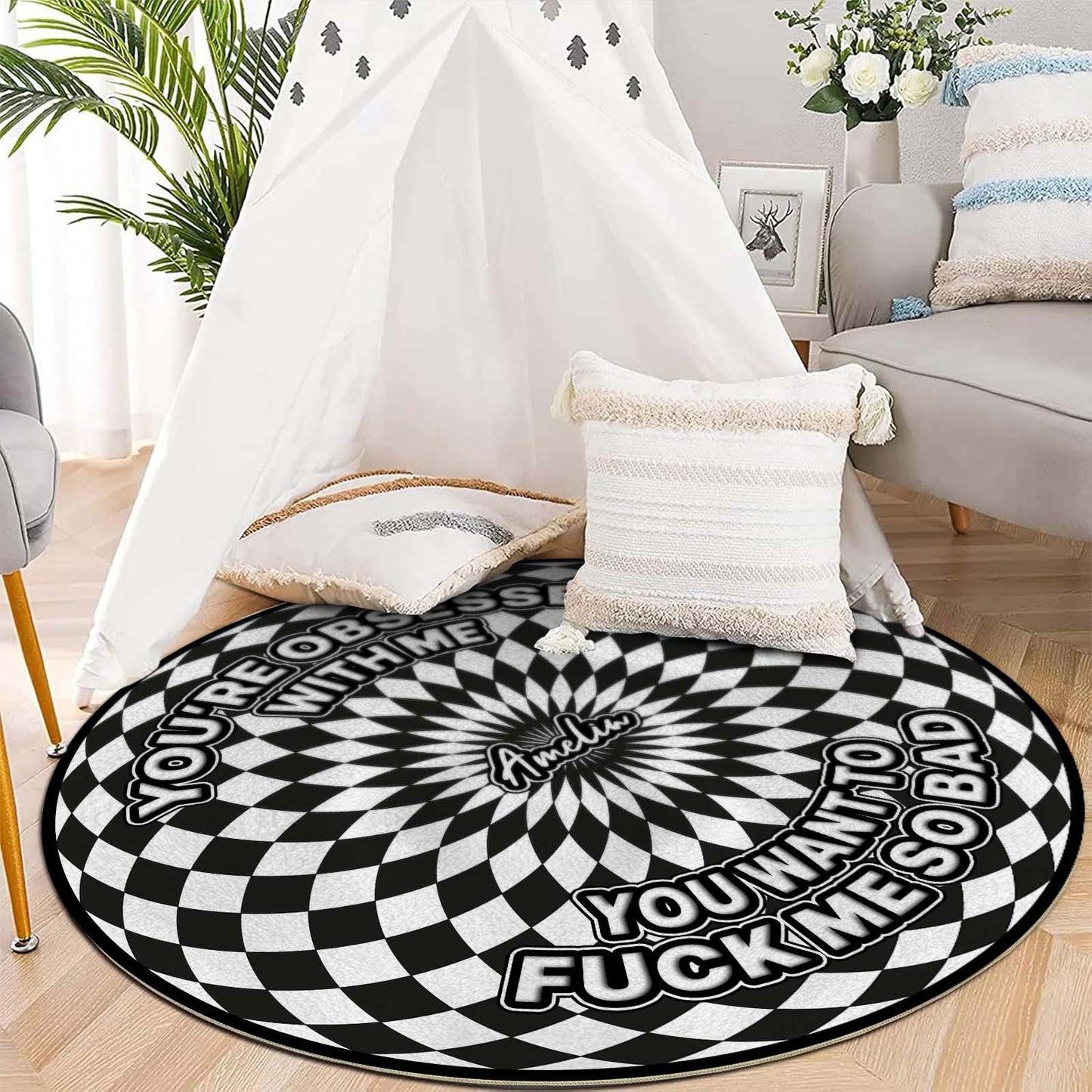 Personalized round mat with black and white checkerboard design featuring playful text for a unique home accent