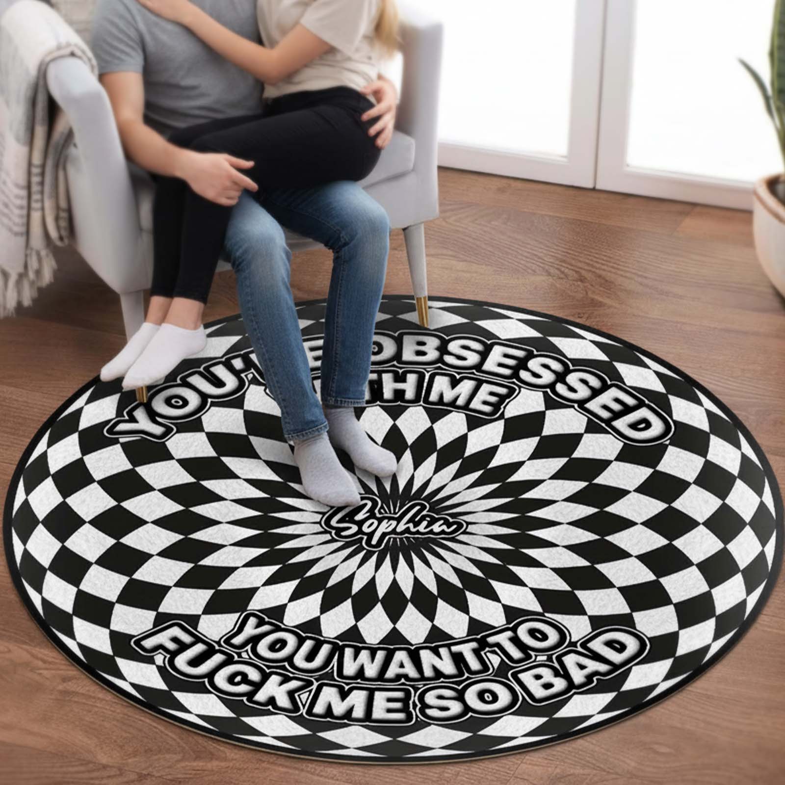 Personalized round mat featuring a black and white optical illusion design with playful text