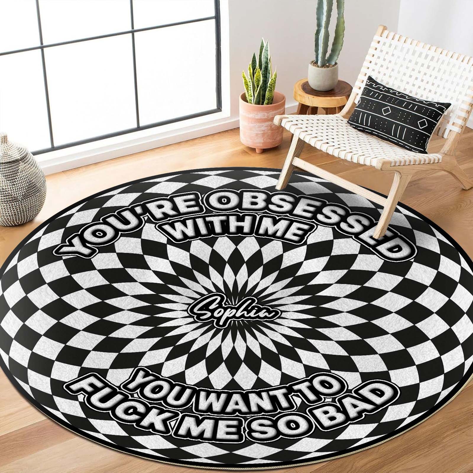 Personalized round mat featuring bold text and a striking black and white design for unique home decor