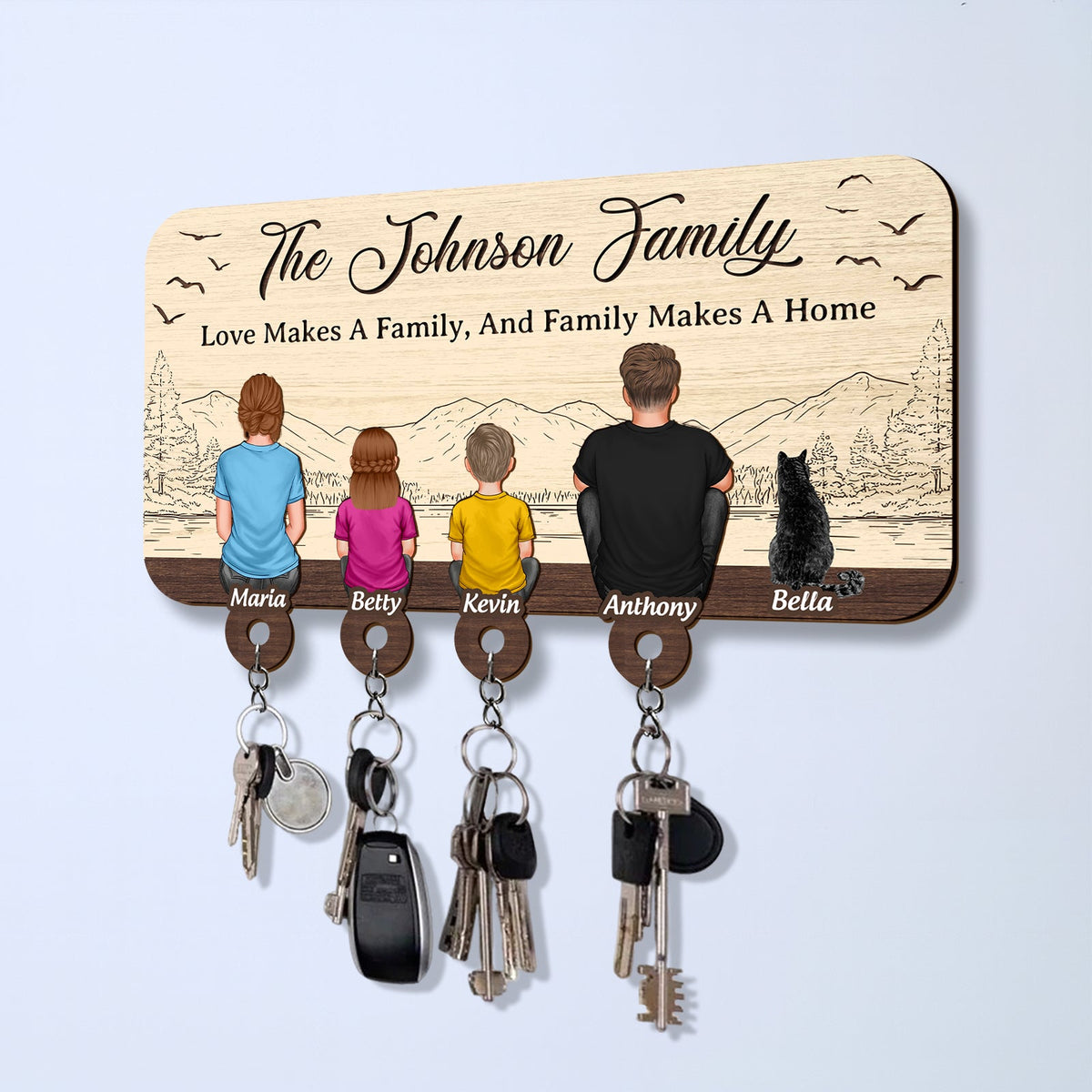 Personalized wooden key holder featuring the Johnson Family with custom names and hooks for keys