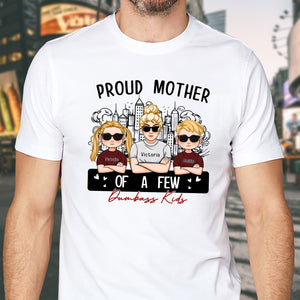 White T-shirt featuring a design that says proud mom of a few dumbass kids with cartoon characters