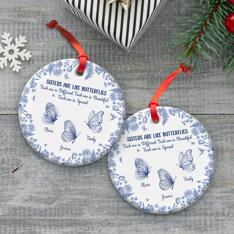 personalized sister ornament round white ceramic with blue butterfly design red ribbon custom names printed
