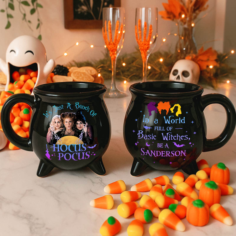 Hocus Pocus Halloween cauldron mug set showing two black cauldron mugs with Sanderson sisters design and candy