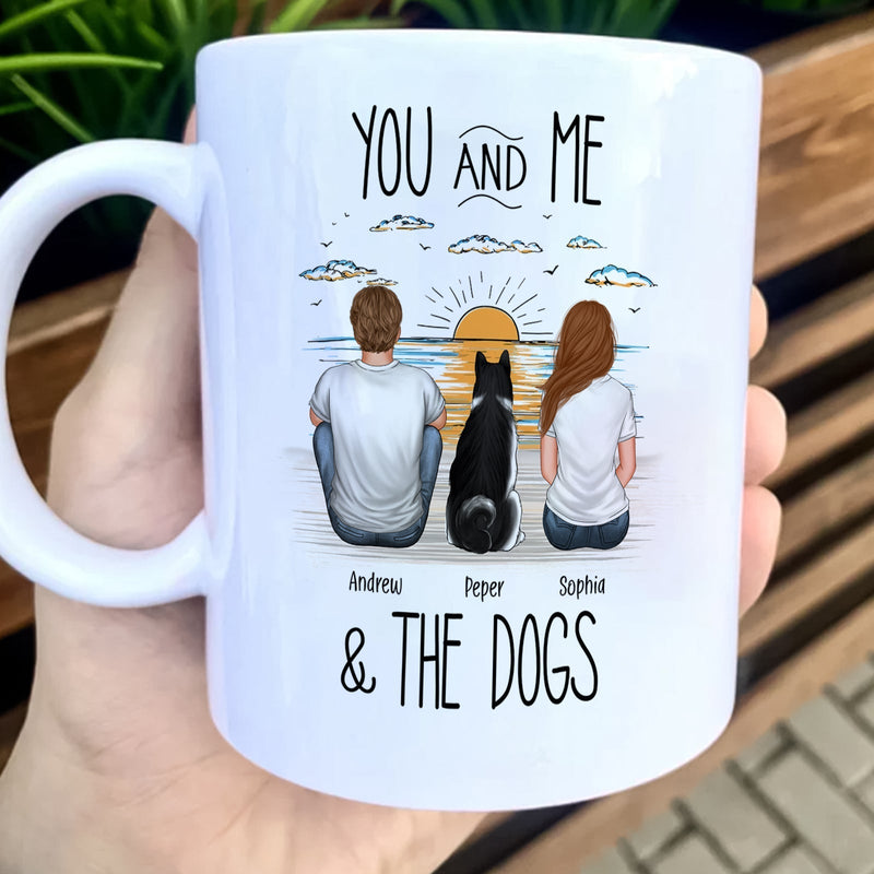 Personalized unique pet lover gift mug featuring a couple and their dogs against a sunset backdrop