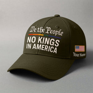 We the People embroidered cap in olive green featuring customizable name and American flag patch
